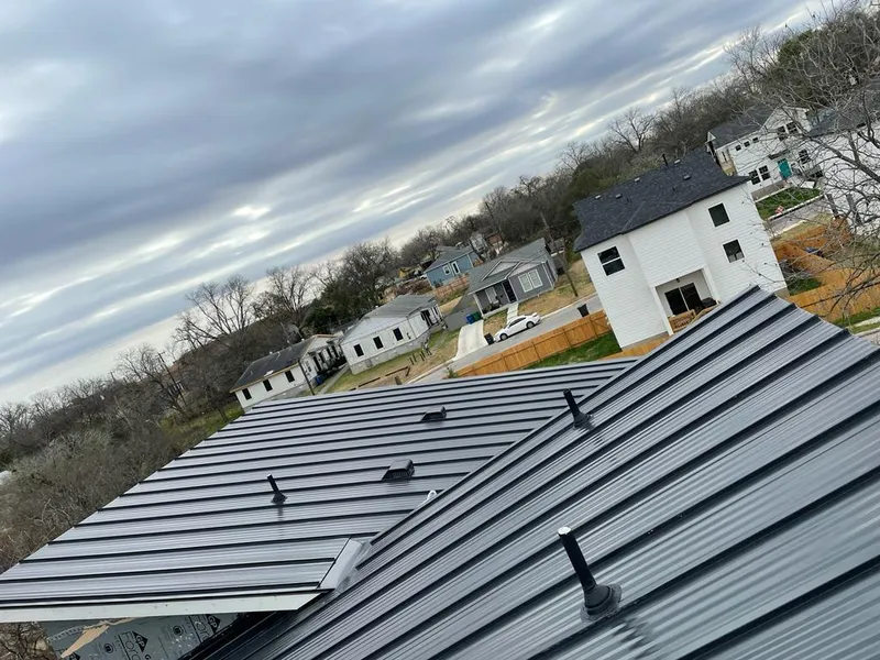 Standing seam metal roof panels with vents for Skylight Repair in South Lyon